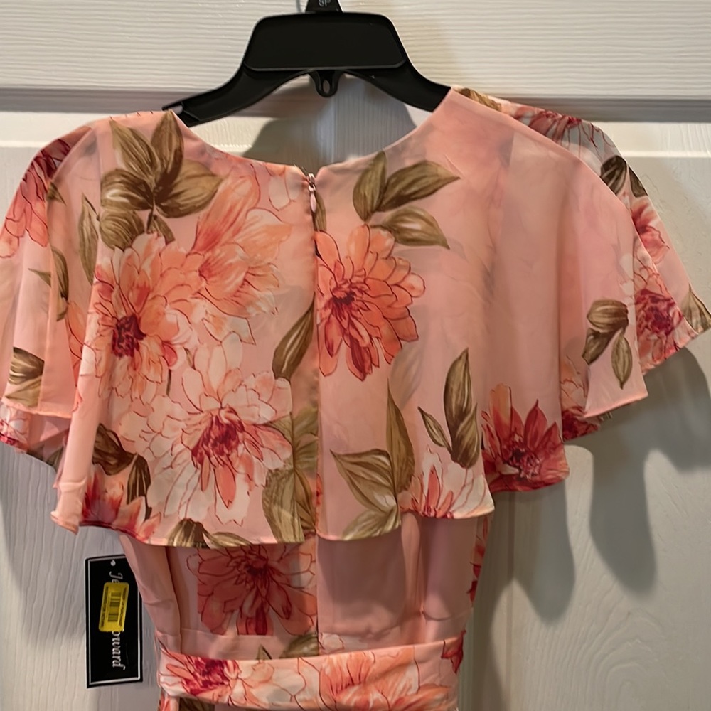 V-neck dress. Ruffle makes flutter sleeves. Tie at waist. - Picture 6 of 6